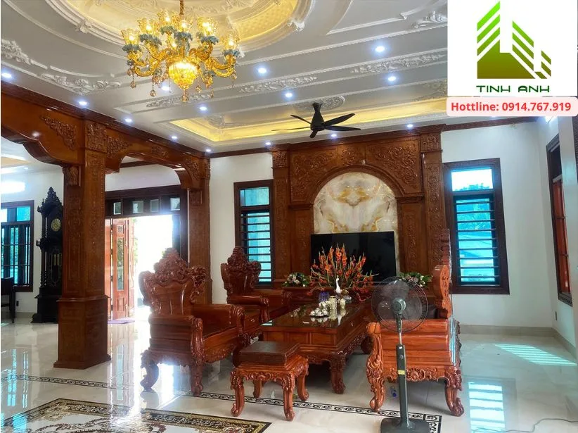 Sơn nhà biệt thự - Bộ bàn ghế gỗ chạm khắc 